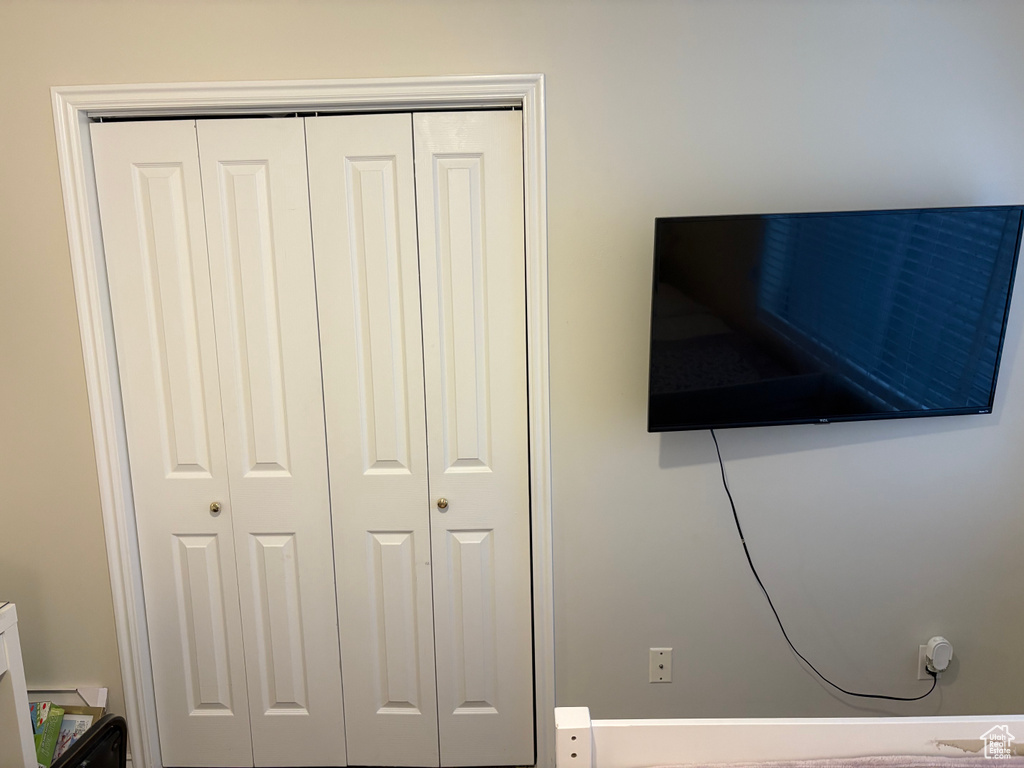 Unfurnished bedroom with a closet