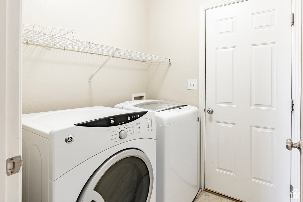 Clothes washing area with washing machine and dryer