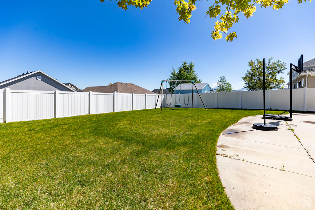 View of yard with a patio