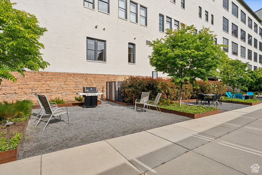 View of community with a patio area