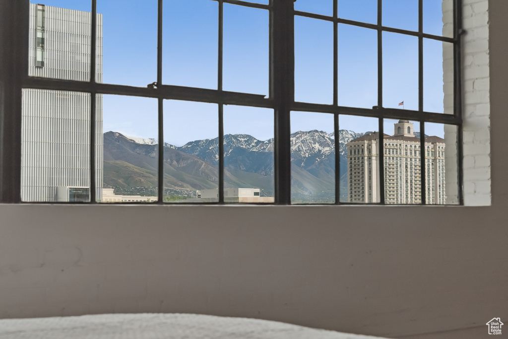 Unfurnished bedroom featuring a mountain view