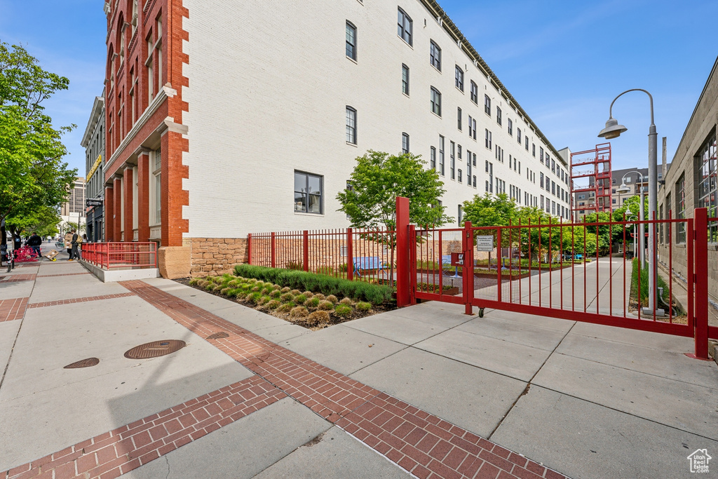 View of property featuring fence