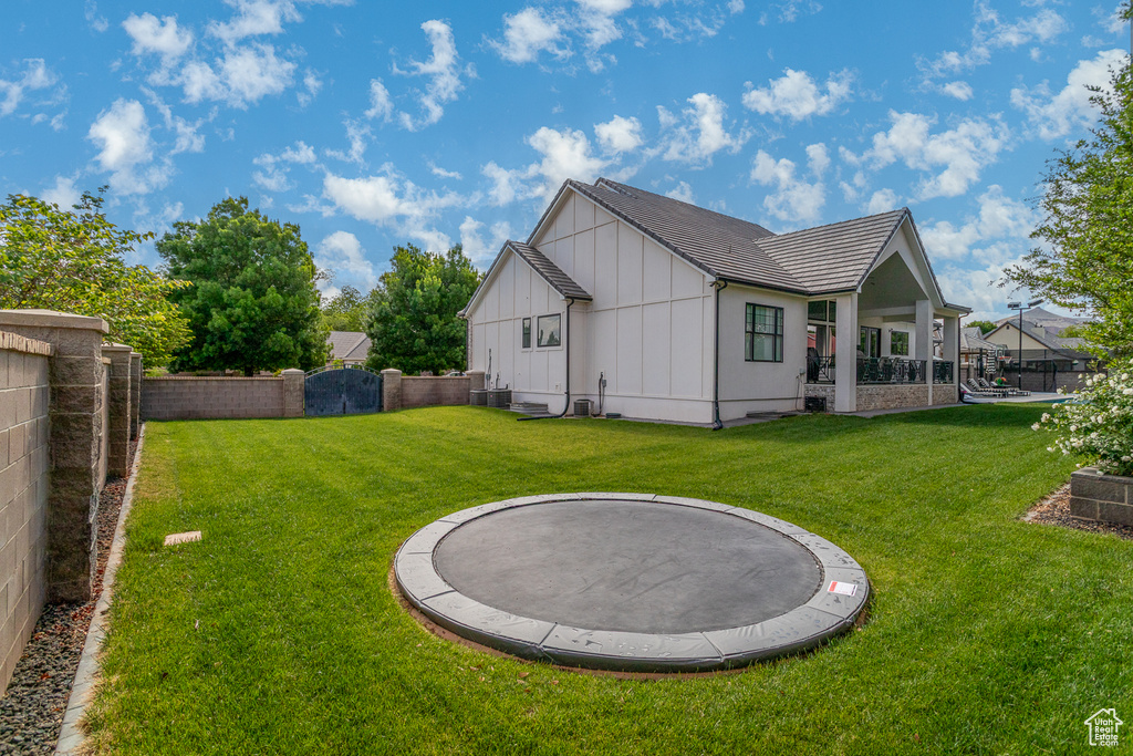 Rear view of property featuring board and batten siding