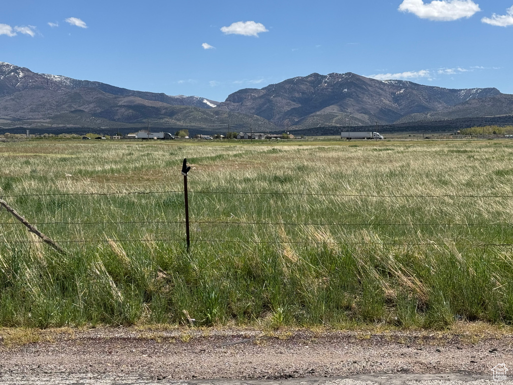 View of mountain background featuring rural landscape
