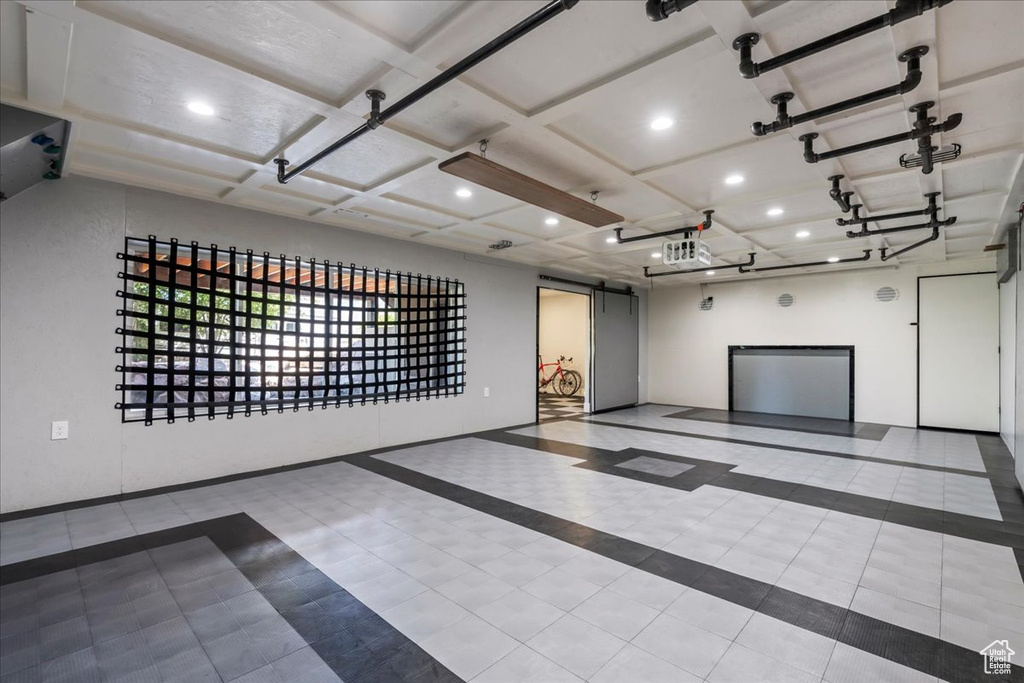 Garage featuring recessed lighting