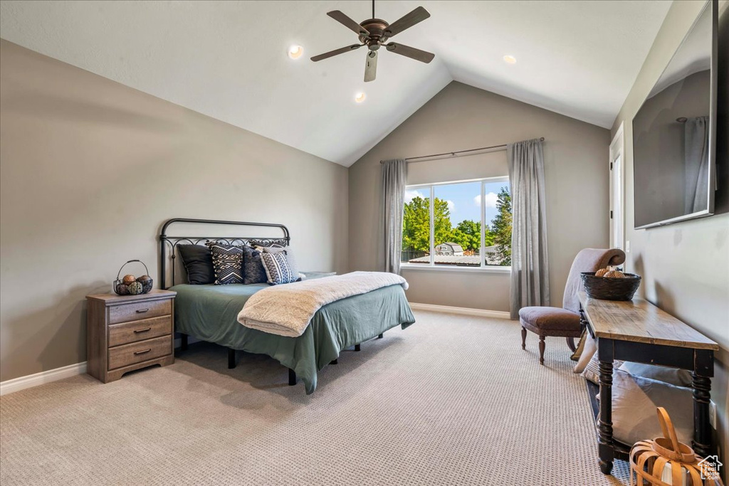 Bedroom with lofted ceiling, light carpet, baseboards, a ceiling fan, and recessed lighting