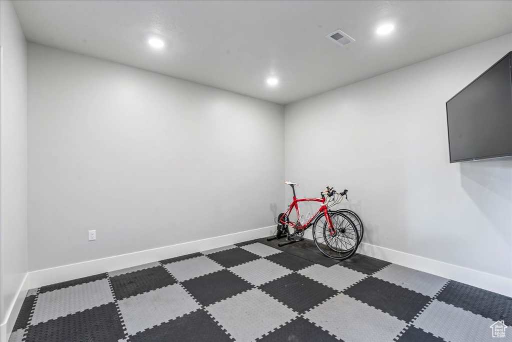 Rec room with recessed lighting and baseboards