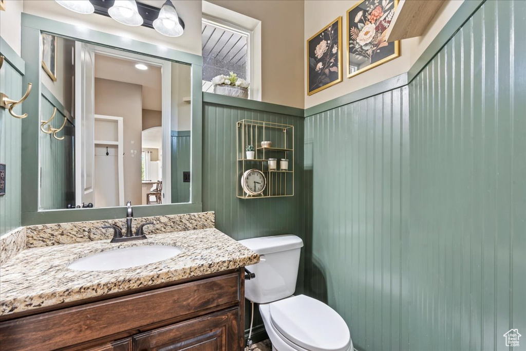 Half bath with toilet and vanity