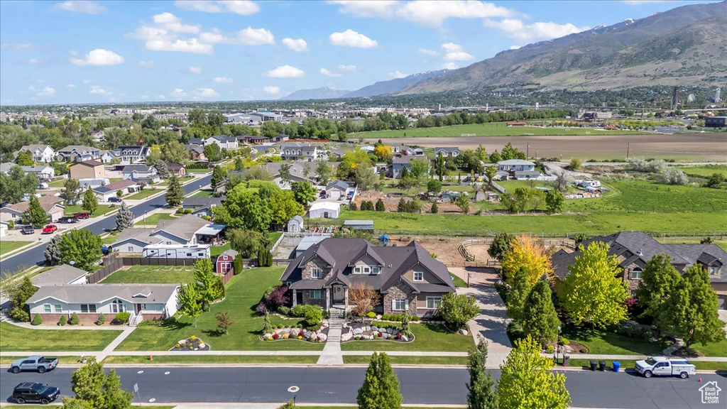 View of property location featuring nearby suburban area and a mountainous background
