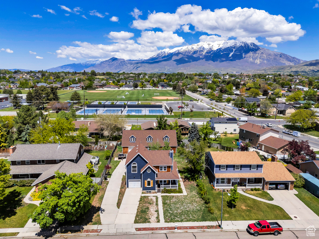 Aerial view of residential area with a mountainous background