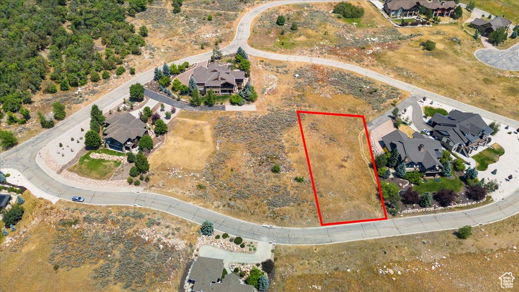 Aerial perspective of suburban area with property parcel outlined