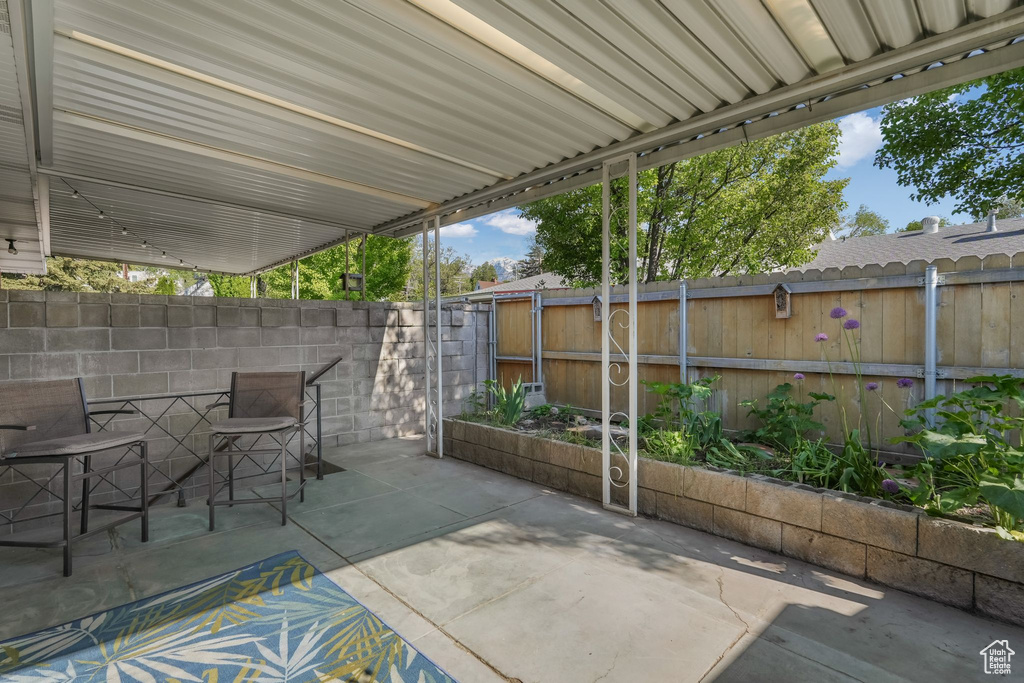 View of patio featuring a fenced backyard