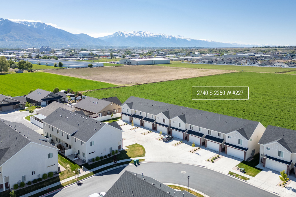 Aerial view of residential area featuring mountains