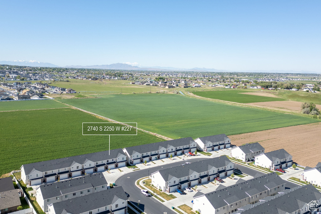 Aerial perspective of suburban area with mountains