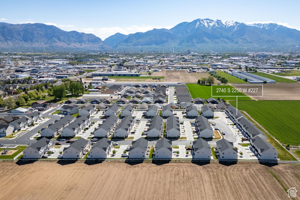 Aerial view of residential area with a mountain backdrop