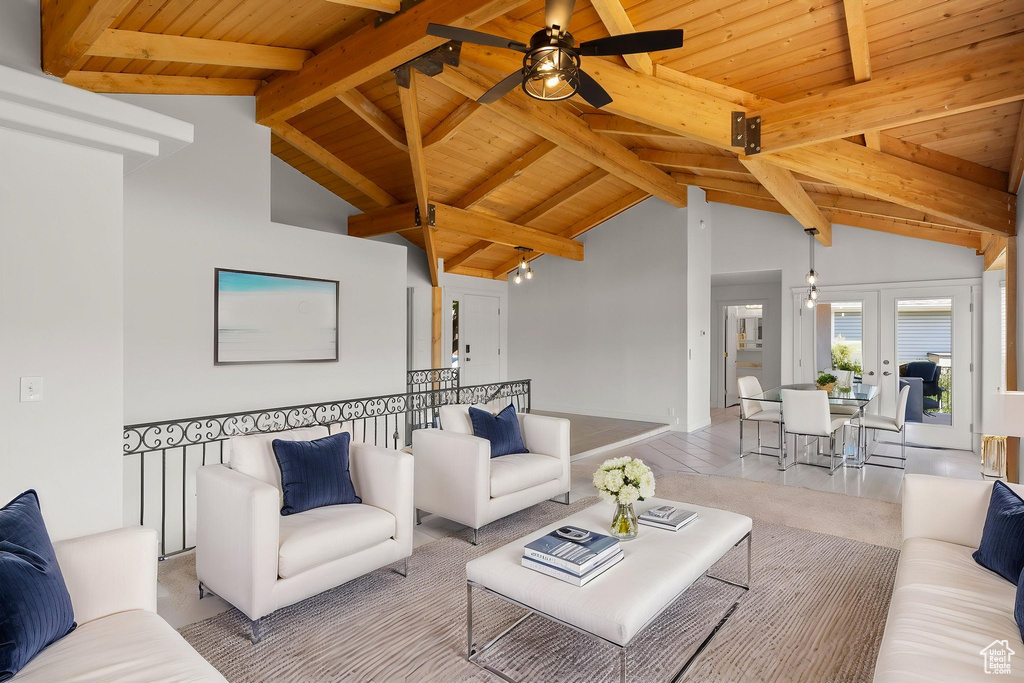 Living room with wooden ceiling, ceiling fan, and french doors