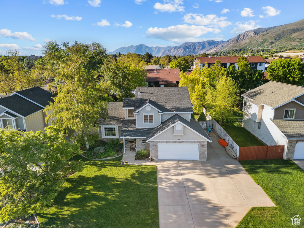Aerial view of residential area with mountains