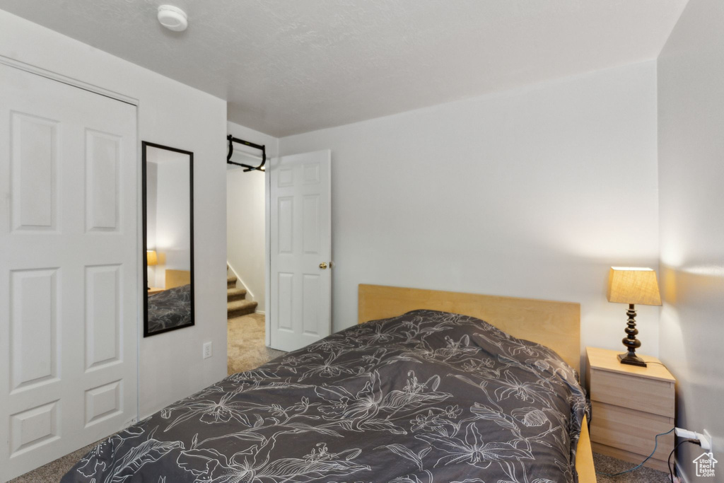 Bedroom with carpet floors