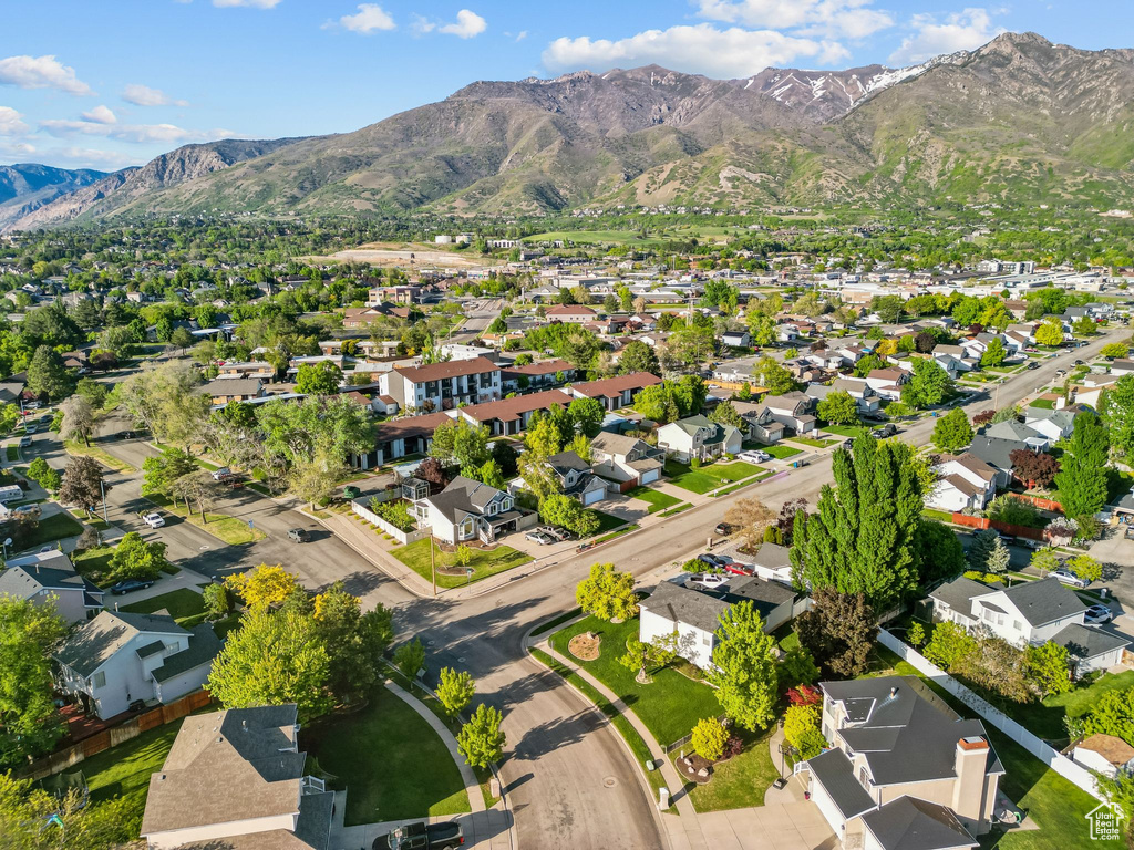 View of property location with a mountainous background and nearby suburban area
