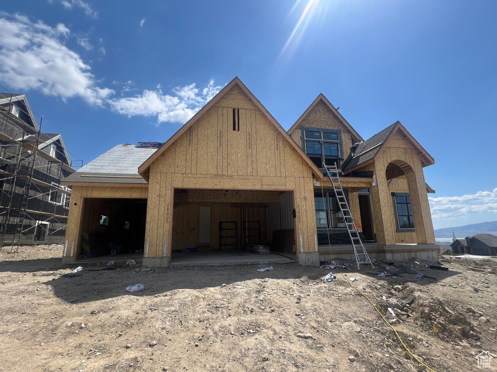 Property in mid-construction with a garage