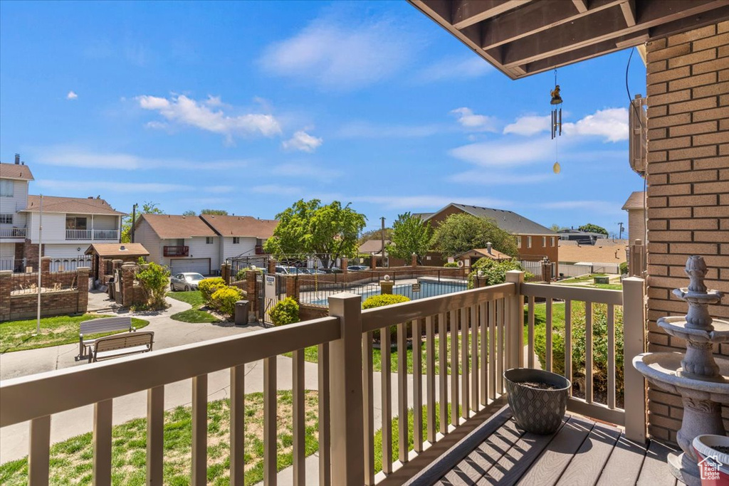 Balcony featuring a residential view