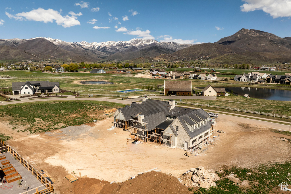 Mountain view featuring a nearby body of water