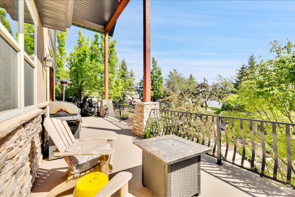 View of patio / terrace with a balcony