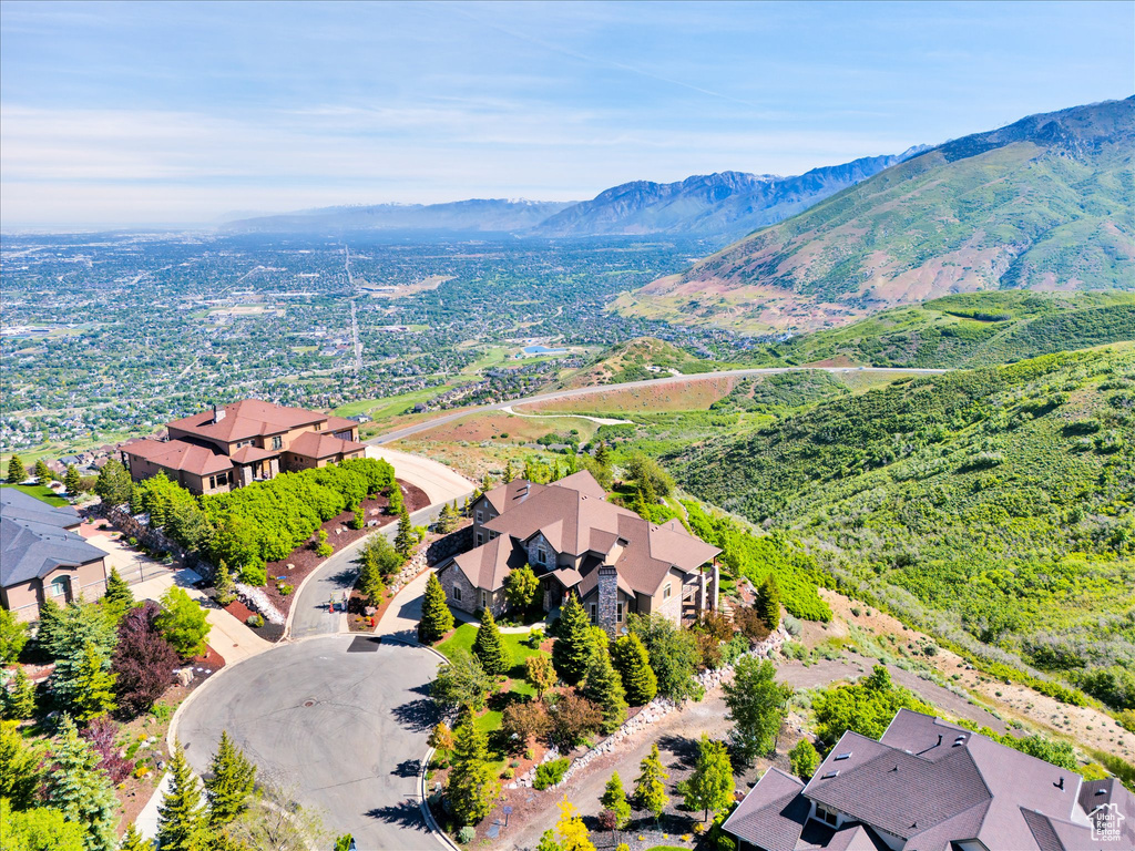 Aerial perspective of suburban area featuring mountains