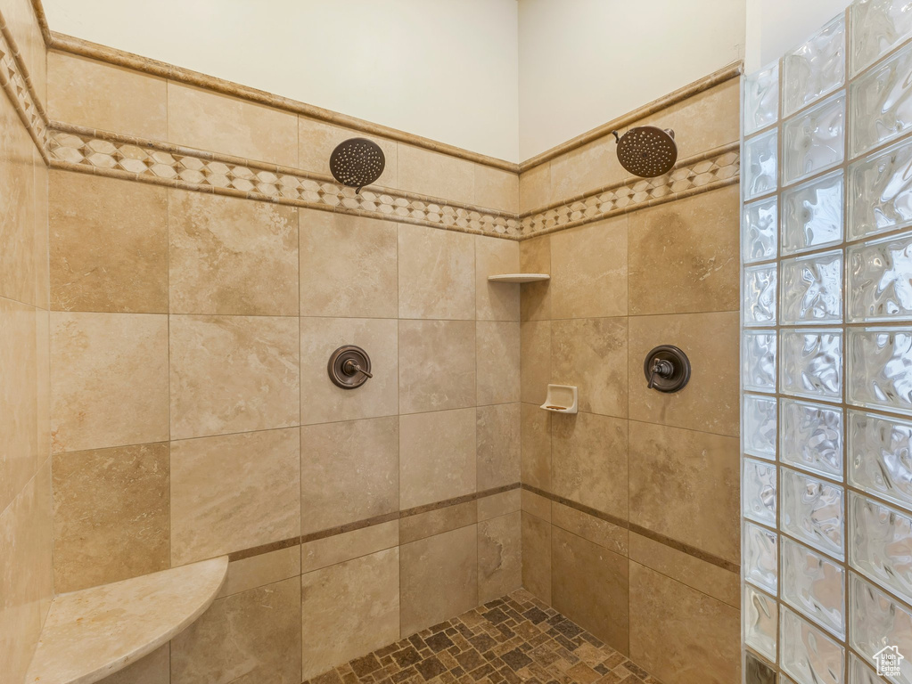 Full bath with tiled shower
