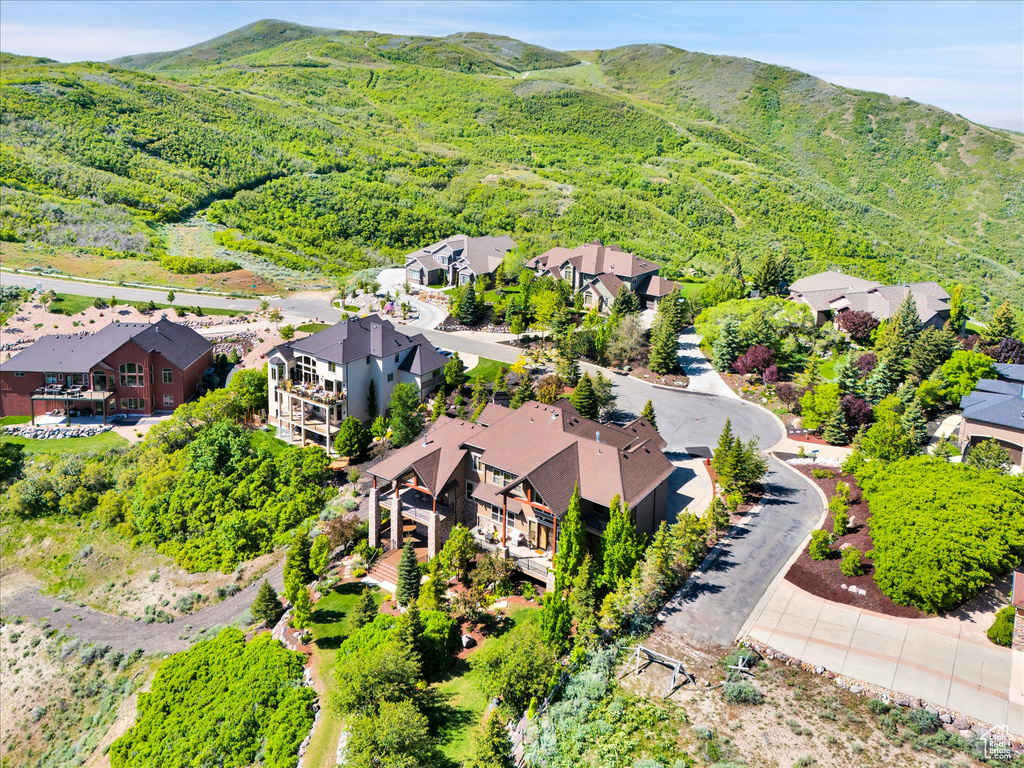 Aerial perspective of suburban area with mountains