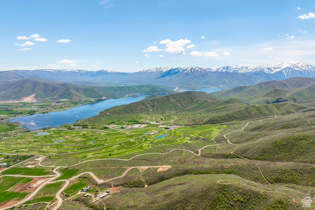 View of mountain backdrop with a large body of water