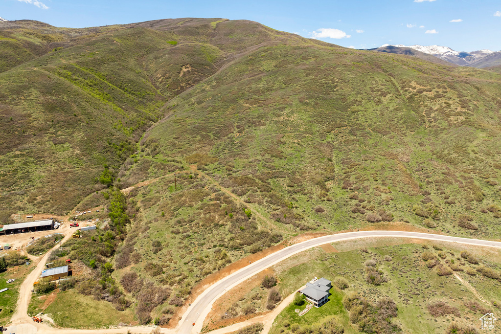 Aerial view of property\'s location with mountains