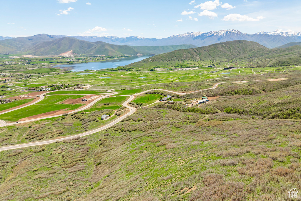 Mountain view with a nearby body of water