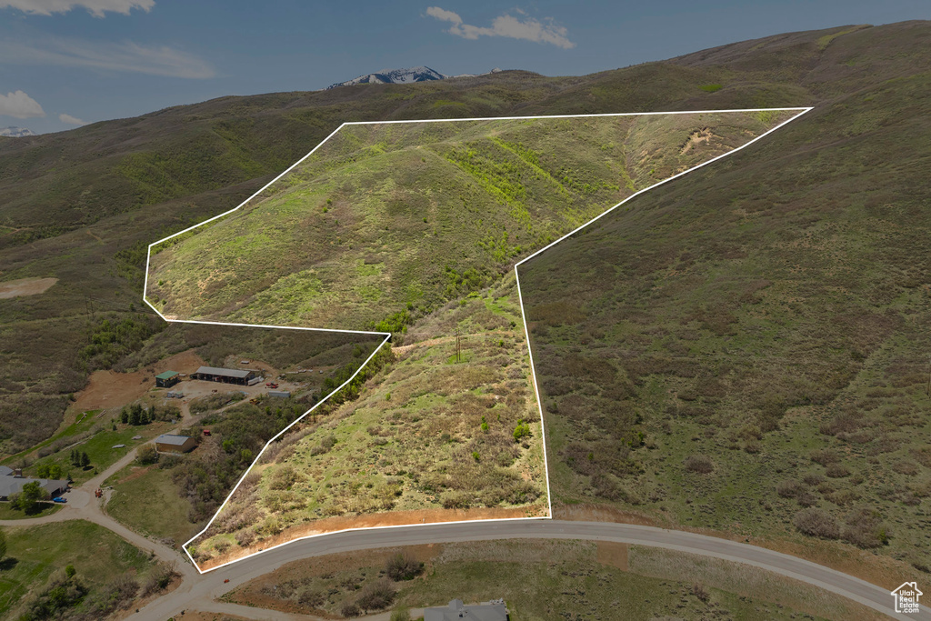 View of property location featuring property parcel outlined and a mountainous background