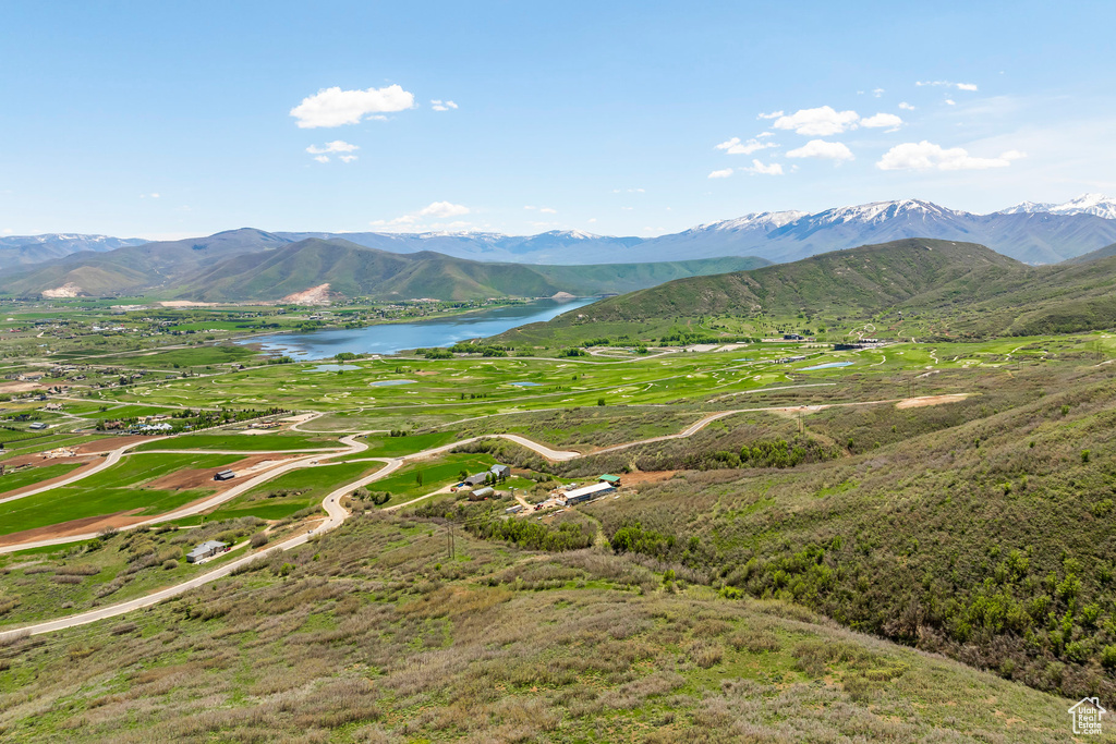 View of mountain backdrop with a large body of water