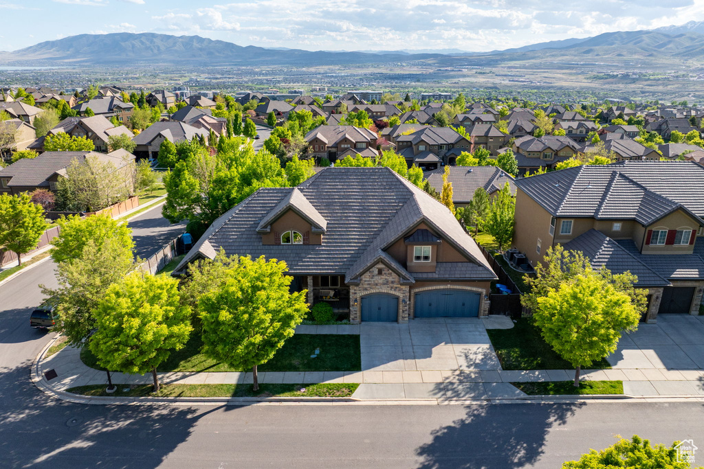 Aerial view of residential area with mountains