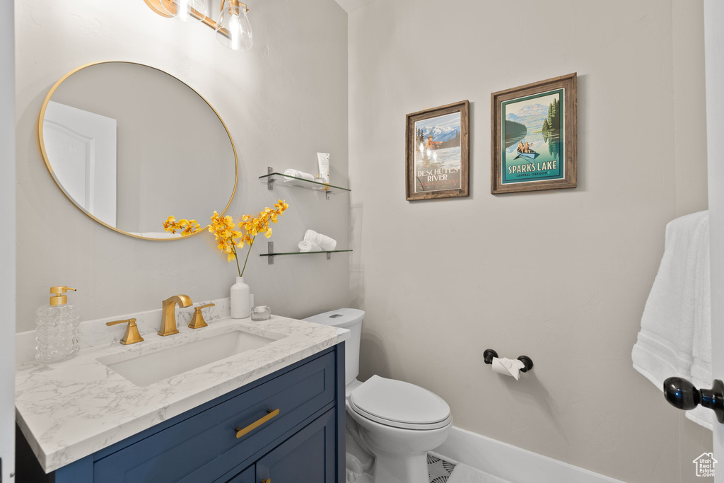 Bathroom featuring toilet and vanity
