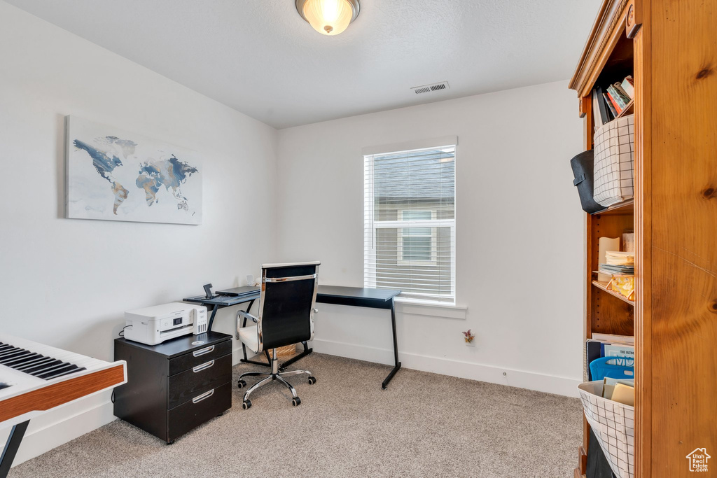 Office featuring carpet flooring and baseboards