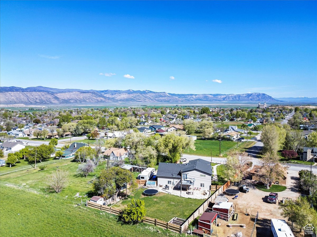 Aerial view of residential area featuring mountains