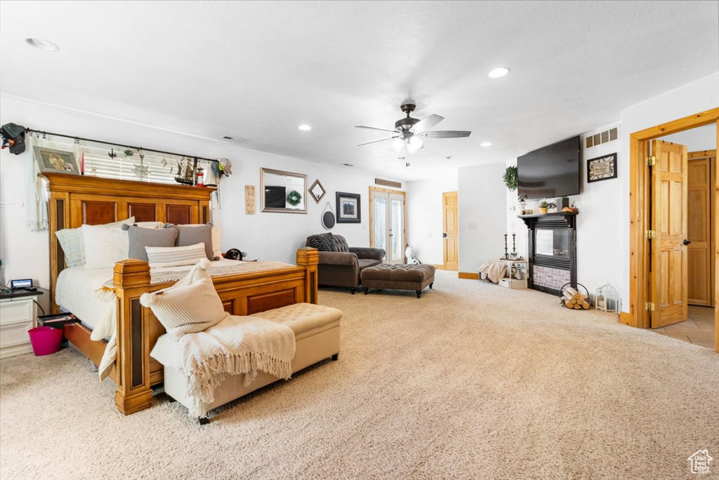 Bedroom featuring carpet flooring, recessed lighting, and a ceiling fan
