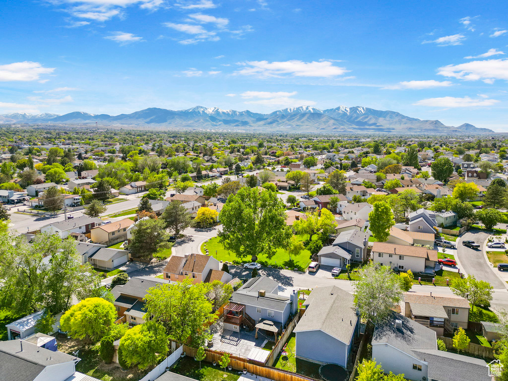 Aerial perspective of suburban area featuring mountains