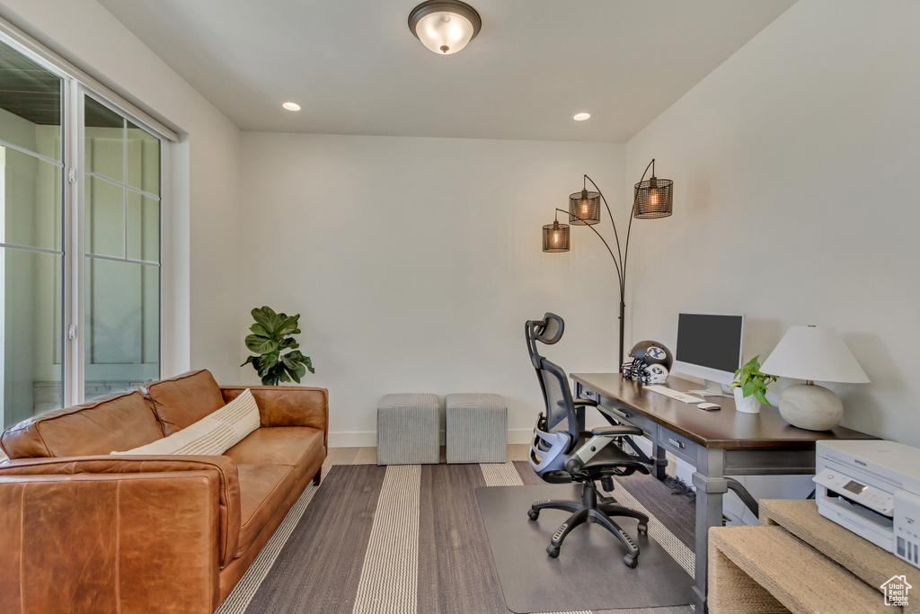 Office with wood finished floors, recessed lighting, and baseboards