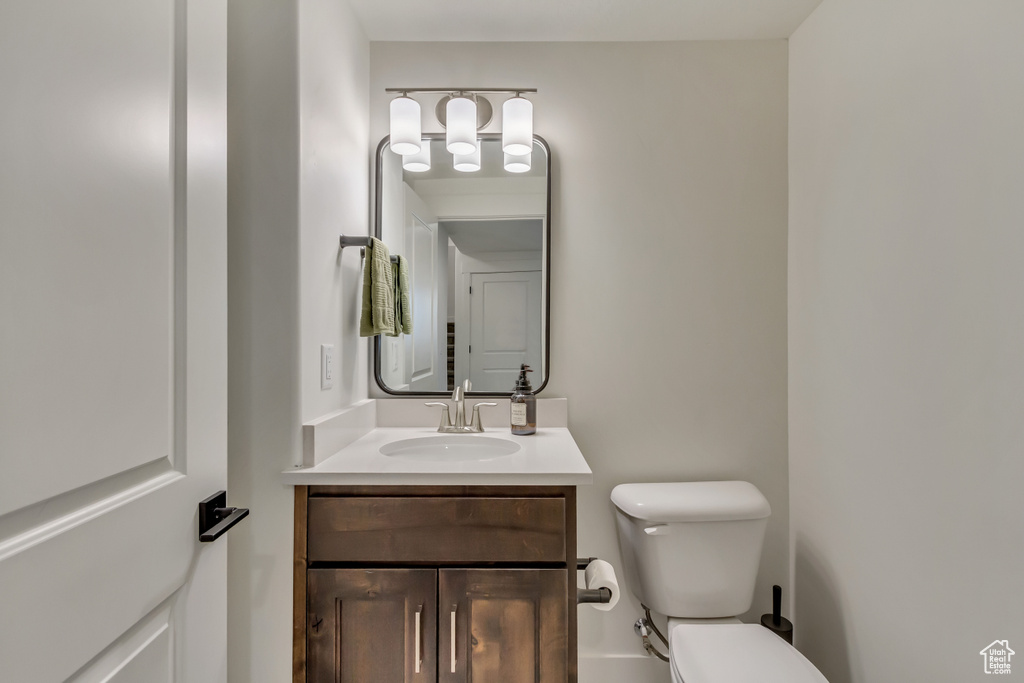 Bathroom featuring toilet and vanity