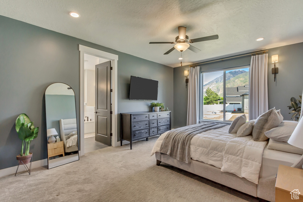 Bedroom with access to outside, carpet floors, connected bathroom, recessed lighting, and a ceiling fan