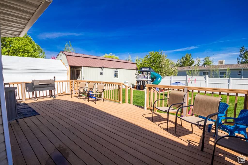 Wooden terrace with a playground