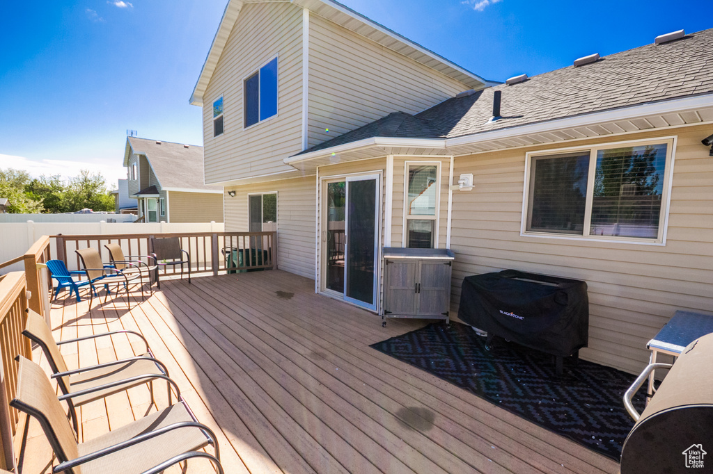 Wooden terrace with area for grilling