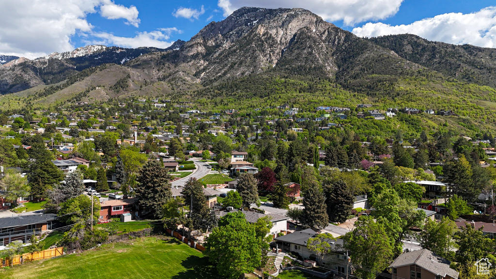 View of mountain background featuring nearby suburban area