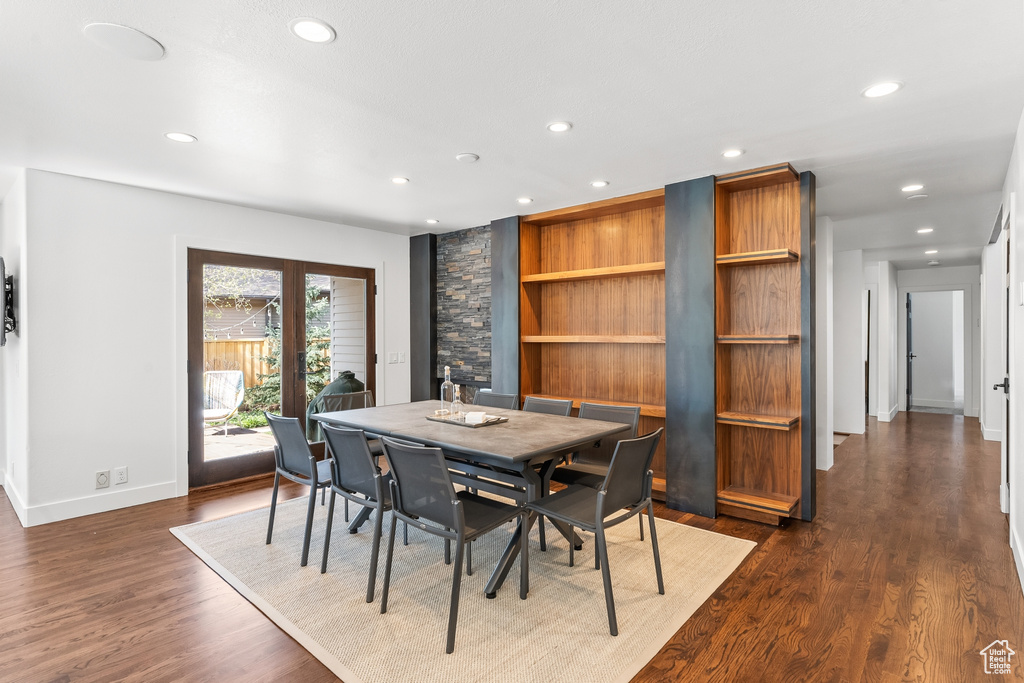 Dining space featuring recessed lighting, baseboards, and dark wood finished floors