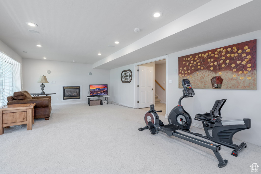 Exercise area with carpet flooring, recessed lighting, and baseboards