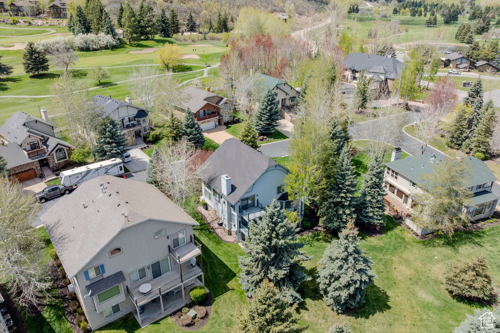 Aerial view of residential area with a local golf course